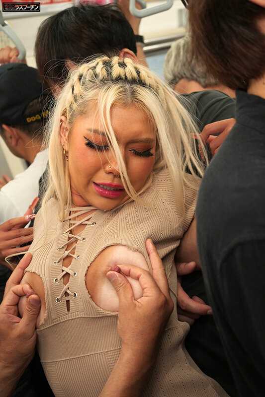 A sensitive woman named Sena Rumina experiences intense stimulation on a crowded train while wearing a revealing outfit, leading to uncontrollable expressions